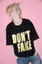 Load image into Gallery viewer, Black and Gold DON&#39;T FAKE Tee Shirt

